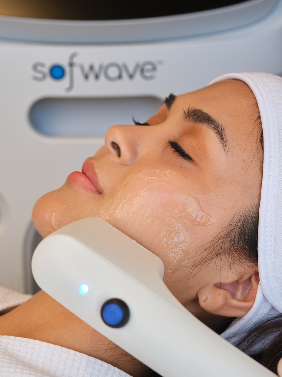 Woman enjoying her Sofwave treatment